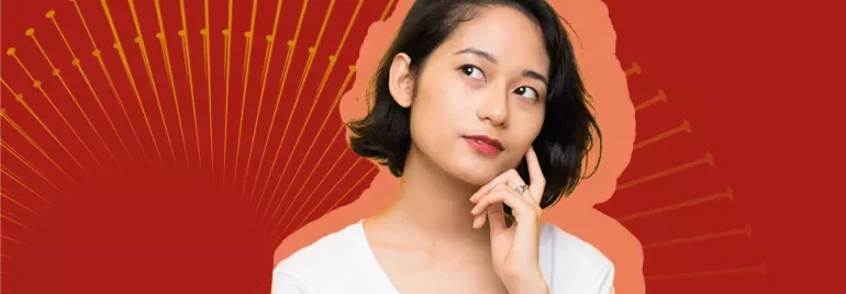 Person thinking against a red background with a sunburst pattern.