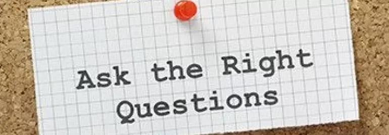 Text reading 'Ask the Right Questions' pinned to a corkboard.