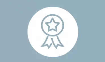Icon of a medal with a star in the center.